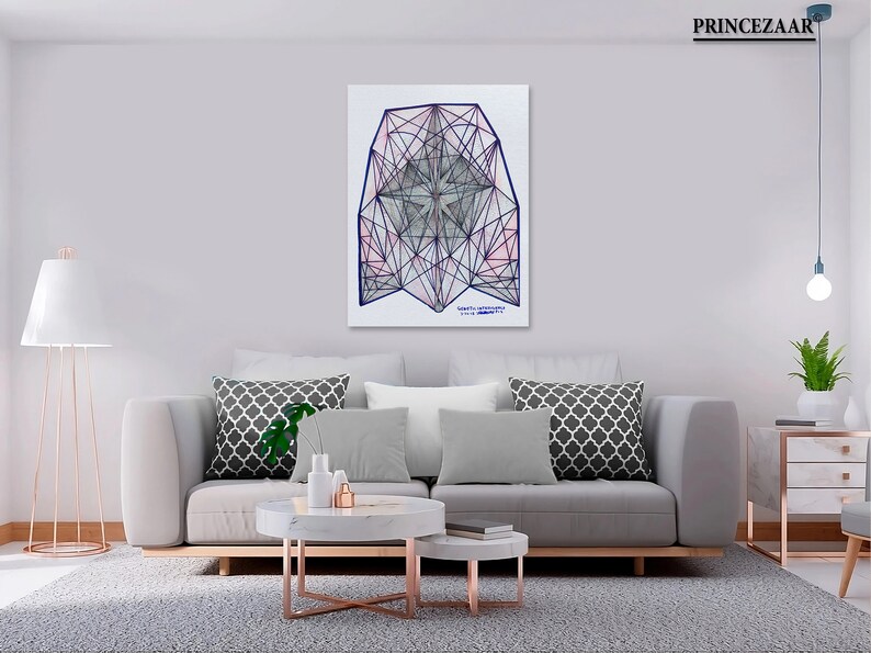May include: A geometric abstract art print with a white background and a blue and pink geometric design. The print is framed and hanging on a wall in a living room setting.