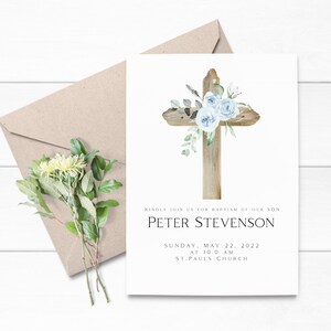 May include: A baptism invitation with a watercolor illustration of a wooden cross adorned with blue flowers. The text reads "Kindly join us for baptism of our son Peter Stevenson Sunday, May 22, 2022 at 10:00 AM St. Paul's Church."
