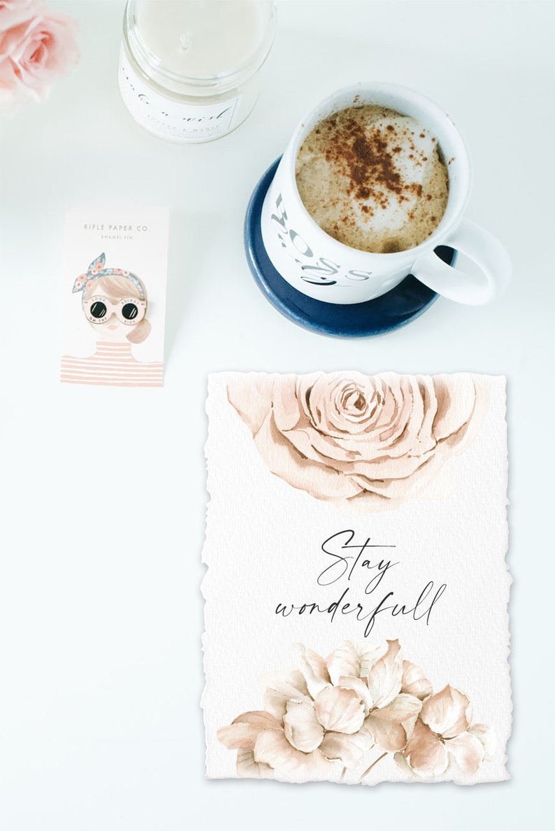 May include: A watercolor print with a beige background and two beige roses. The text "Stay wonderful" is written in black cursive script.