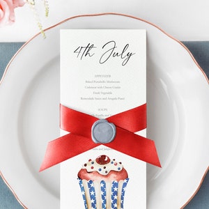 May include: A 4th of July themed menu card with a red ribbon and a wax seal. The menu lists appetizers and soups. The card features a watercolor illustration of a cupcake decorated with red, white, and blue frosting and sprinkles.