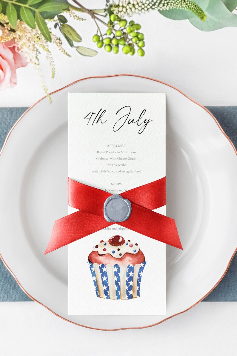 May include: A 4th of July themed menu card with a red ribbon and a wax seal. The menu lists appetizers and soups. The card features a watercolor illustration of a cupcake decorated with red, white, and blue frosting and sprinkles.