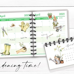 May include: A close-up of a 2021 calendar with a gardening theme. The calendar has a green background with white text and is decorated with watercolor illustrations of gardening tools, plants, and a gnome. The text "Gardening time!" is written in black cursive at the bottom of the image.