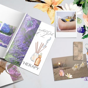 May include: A book titled "Essential Oils A-L" with the word "Aromatherapy" on the cover. The book is open to a page with a watercolor illustration of lavender flowers and a diffuser with essential oil bottles. The book is surrounded by watercolor illustrations of flowers, a photo of a hand receiving a hot stone massage, and a photo of a diffuser with essential oil bottles.