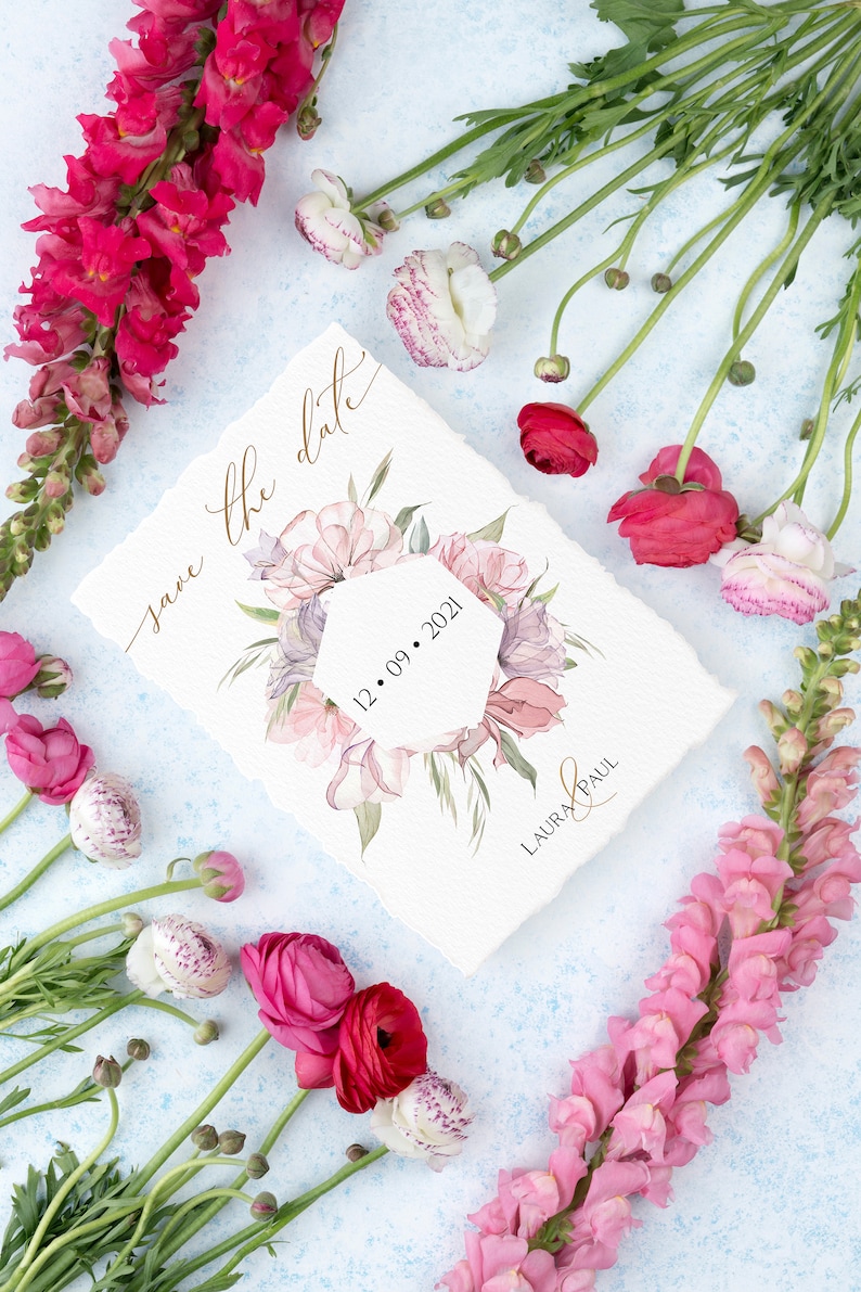 May include: Save the date card with watercolor floral design and the date 12.09.2021. The card is surrounded by pink and white flowers.