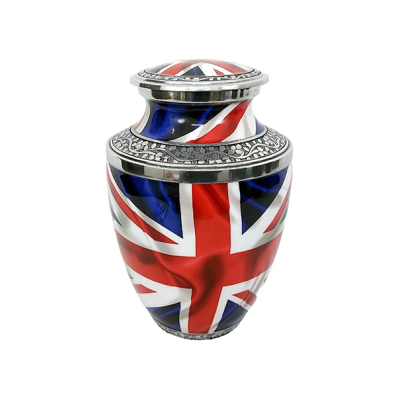 May include: Silver urn with a Union Jack flag design. The urn has a silver lid with a decorative border.
