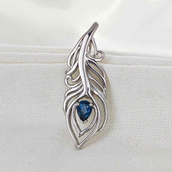 Blue topaz sale brooch