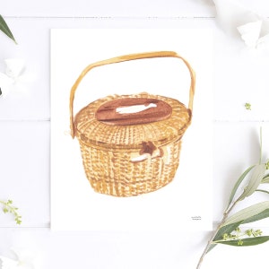 May include: A watercolour painting of a brown wicker basket with a lid and a handle. The basket is woven with a light brown and dark brown pattern.