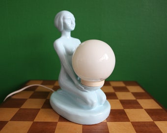 Ceramic table lamp, woman with ball of light from the 70s (light blue)