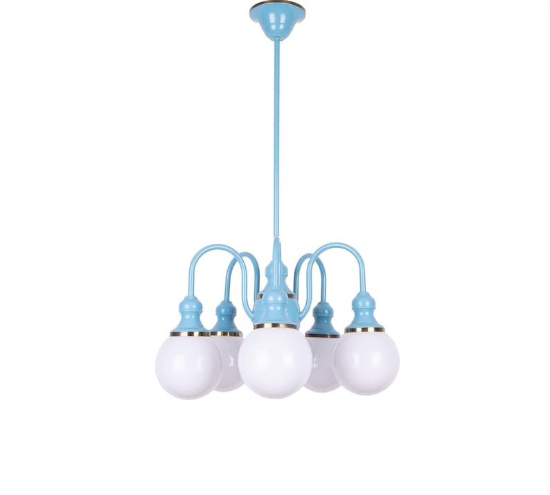 May include: A light blue chandelier with five white globe-shaped light bulbs. The chandelier has a gold trim around the base of each bulb.