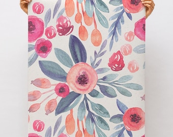 May include: A rectangular sheet of wallpaper featuring a watercolor floral pattern. The design displays pink and red blossoms, muted blue-green leaves, and orange buds scattered across a light, speckled off-white background.
