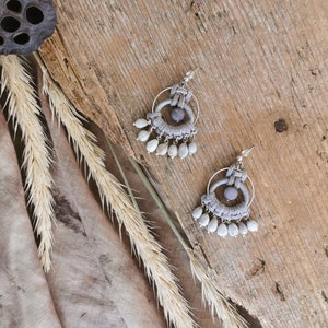 Hanging round drop earrings image 1