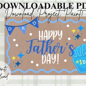 Puede incluir: Un diseño PDF descargable para el Día del Padre. El diseño presenta las palabras "Happy Father's Day!" en escritura azul, un dedo de espuma azul con "#1 DAD" y una pancarta que dice "DAD". El fondo es de color marrón con detalles azules.