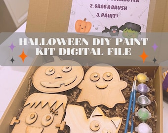 May include: A Halloween DIY paint kit with five wooden cutouts of a pumpkin, ghost, bat, Frankenstein, and a cat. The kit includes paint pots and paintbrushes. The kit is in a brown cardboard box with brown shredded paper.
