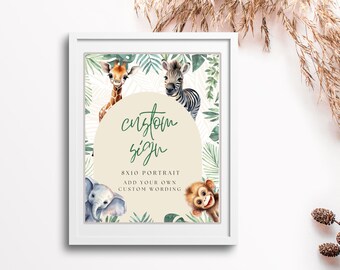 May include: A white frame with a beige background and green foliage surrounding a giraffe, zebra, elephant, and monkey. The text "custom sign" is written in green cursive. The text "8x10 portrait add your own custom wording" is written in black.