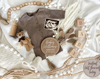 May include: A wooden sign with the text "Baby Williams Arriving July 2024" surrounded by a brown knitted baby outfit, a teddy bear, a bottle, wooden blocks spelling "BABY", and white and brown beaded garlands.