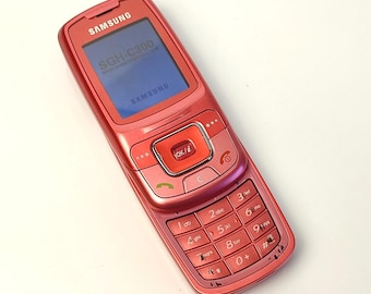 Zabytkowy różowy telefon Samsung SGH-C300 z suwakiem. Działa, sieć zablokowana! Telefon komórkowy Y2K.