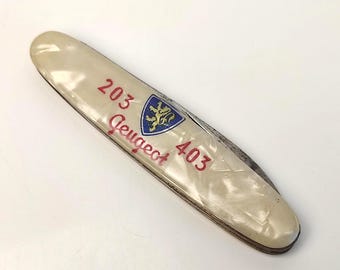 Vintage Peugeot reklamkniv Contento Tyskland Fickkniv Afrika Uganda Återförsäljarkampanj Fällkniv SÄLLSYNT Automobilia (ej slipad)