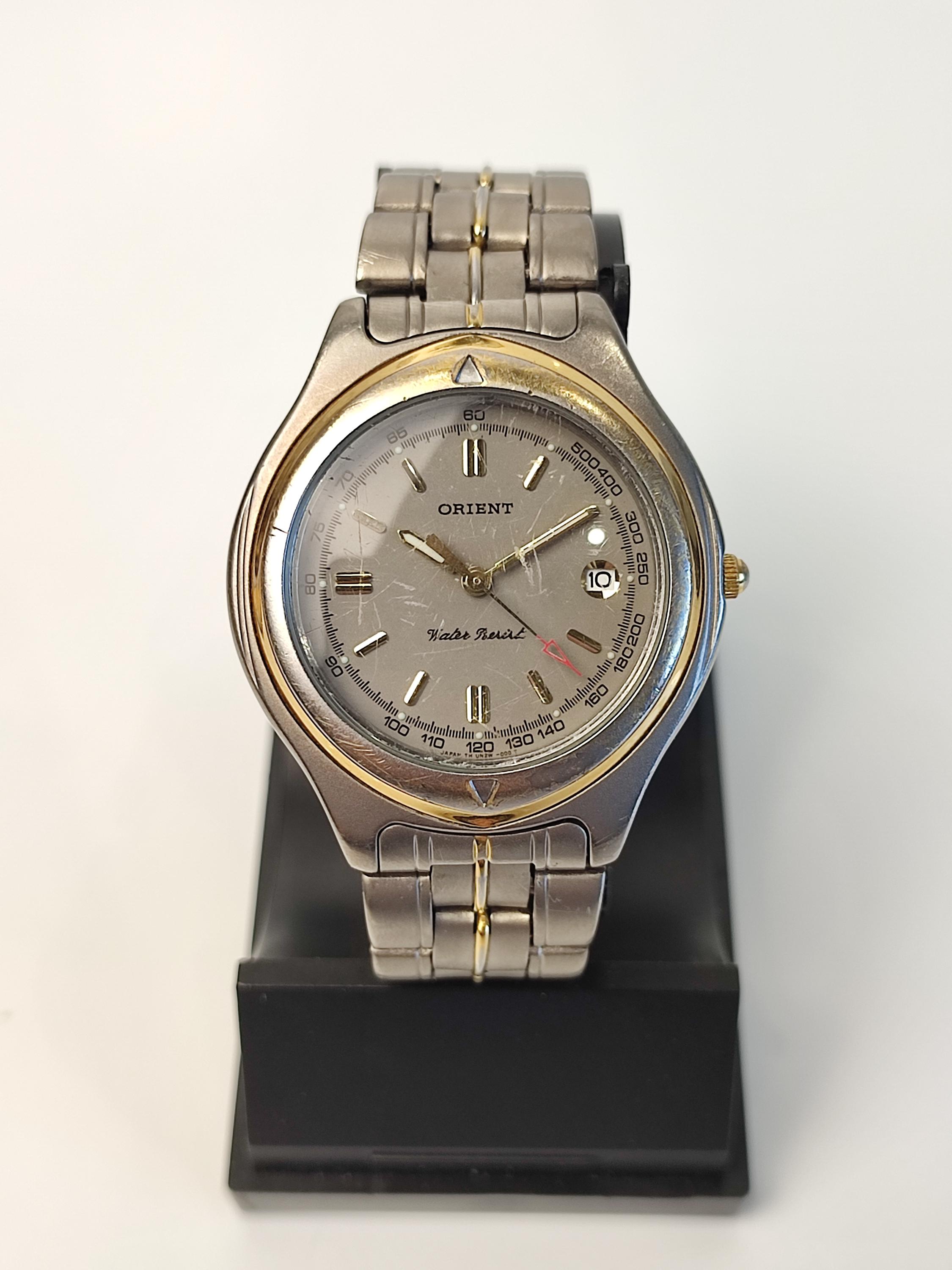 希少　ORIENT　日本製　ヴィンテージ　ポストモダン　壁掛け　24時間　時計 Vintage Orient Titanium Quartz Watch: Japan Made Men's Date