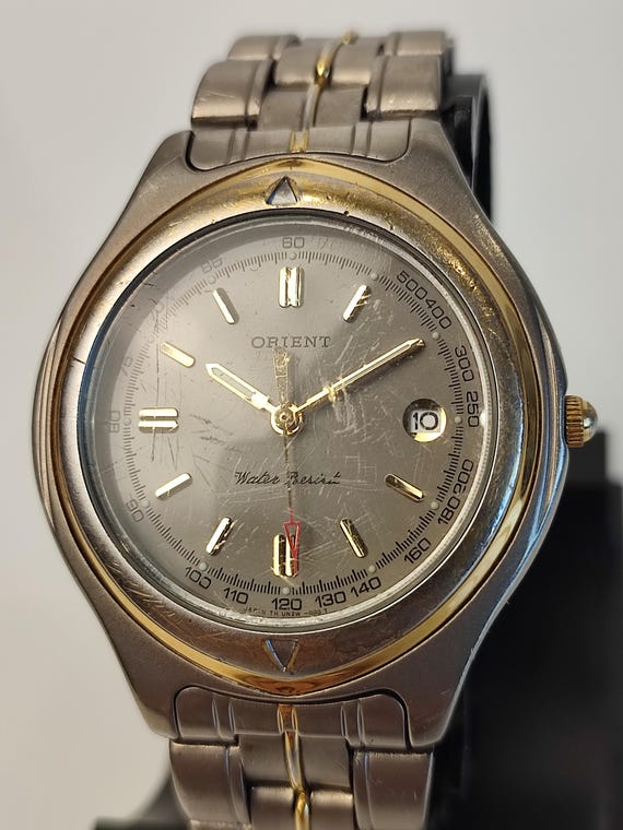 Vintage Orient Titanium Quartz Watch: Japan Made Men's Date