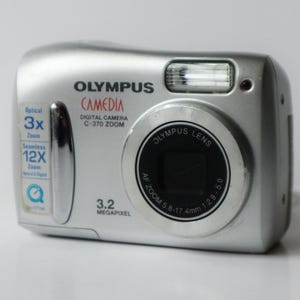 OLYMPUS Camedia C-370 Zoom vintage zilveren digitale compactcamera voor onderdelen/reparatie