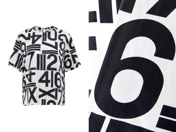 Silk Numeral Graphic Short Sleeve Blouse | M, L, X