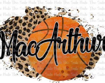 May include: A basketball with an orange and brown watercolor design, with the name "MacArthur" written in black cursive script over the ball. The background is a brown and black leopard print.