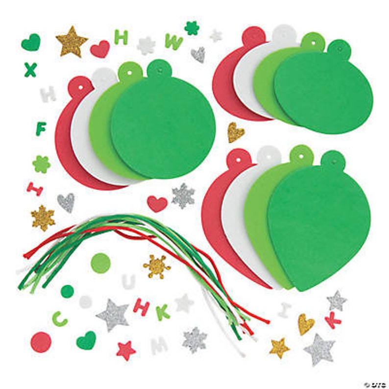 May include: A craft kit for making Christmas ornaments. The kit includes red, white, and green felt ornaments, green and red yarn, and various embellishments like stars, hearts, and letters.