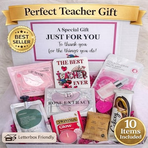 May include: A gift box labeled "Perfect Teacher Gift" containing beauty products. Items include lip masks, eye patches, a facial mask, a candle, and a heart-shaped item. The box includes a card that says "The Best Teacher Ever."