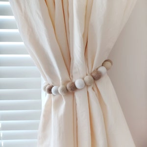 Boho curtain tie backs nursery Farmhous curtain tiebacks White curtain holdback Kids pom pom curtain pull back Cream Girls neutral room