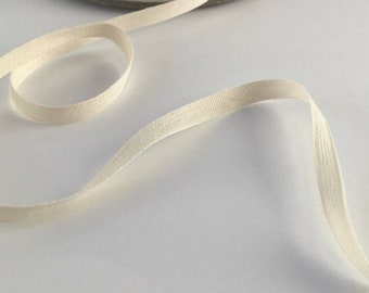 6mm (1/4") wide ecru Organic GOTS plaited cotton stay tape