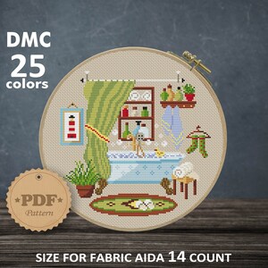 May include: A cross-stitch pattern depicting a bathroom scene, displayed in a wooden hoop. The design includes a bathtub, shower curtain, and shelves with toiletries. The text "DMC 25 colors" is at the top. The pattern size is 18.87 x 18.51 cm.