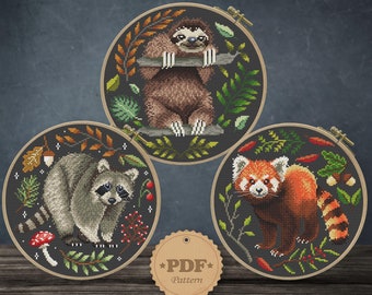 Schema punto croce animali della foresta: procione, panda rosso, bradipo (schema PDF)