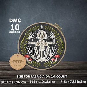 May include: A cross-stitch pattern featuring a skeleton design within a circular frame. The design includes a skeleton, green foliage, and red mushrooms on a black background. The text "DMC 10 colors" is at the top. The pattern size is 7.93 x 7.86 inches.