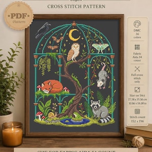 May include: A cross stitch pattern titled WOODLAND ANIMALS featuring a dark background with a central tree, a crescent moon, and various animals including an owl, fox, raccoon, and opossum. The design includes 36 DMC colors, 152 by 196 stitches, and measures 10.86 by 14.00 inches on 14 count Aida fabric.
