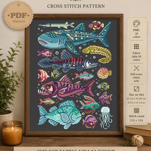 May include: A cross stitch pattern titled FISHES featuring a collection of colorful aquatic creatures including a whale shark, a jellyfish, and various fish on a dark background. The design includes 28 DMC colors for 14 count Aida fabric, measuring 9.14 by 13.14 inches.
