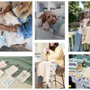 May include: A white blanket with a variety of colorful tags attached to it. The tags have handwritten messages on them. The blanket is shown in different settings, including a living room, a bedroom, and outdoors. The blanket is a great way to add a personal touch to any space.