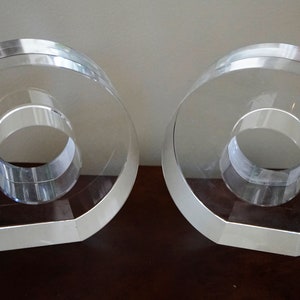 Pair of Solid Glass Block Bookends shaped like Doughnut Holes From Grace Home Furnishings