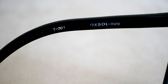 Lunettes De Soleil Laura Biagiotti Modèle 2/S D28 - Monture Noire Acétate, Verres Marron UV400