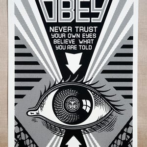 Obey (Black) “Never Trust Your Own Eyes” Lithograph Hand Signed by the Artist SHEPARD FAIREY