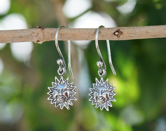 Antiqued Sun Face Dangle Earrings