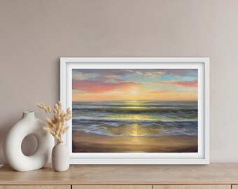 May include: A framed painting of a seascape with a golden sunset over the ocean. The painting features a sandy beach, blue water, and a bright orange sun.