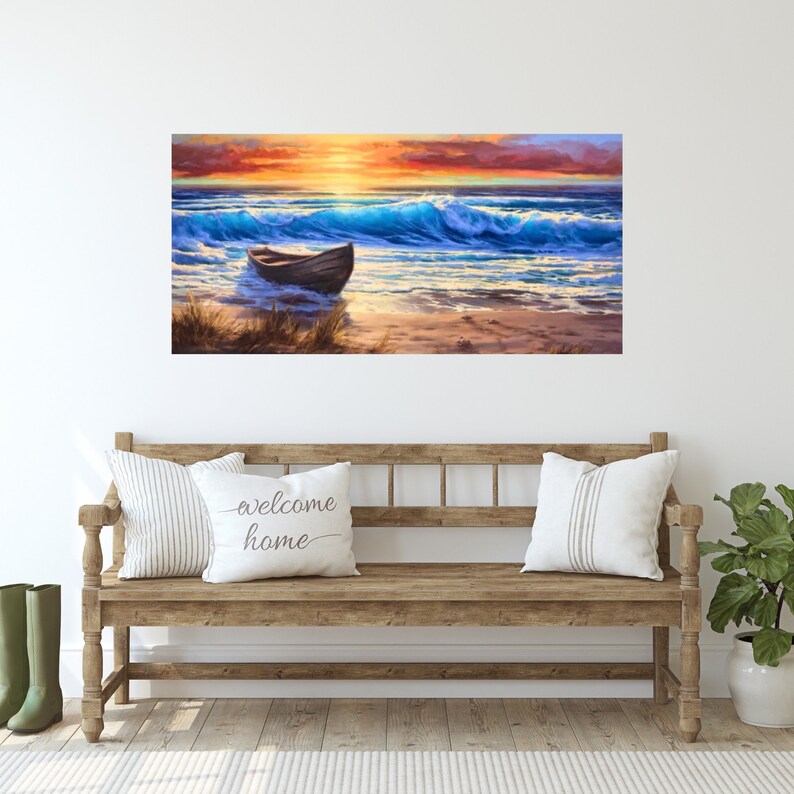 May include: A painting of a wooden boat on a sandy beach with blue waves crashing in the background. The sky is a vibrant orange and pink sunset.