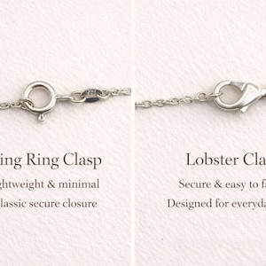 May include: A comparison of two silver-toned necklace closures. On the left, a circular spring ring clasp with the text Spring Ring Clasp, Lightweight & minimal, Classic secure closure. On the right, a lobster clasp with the text Lobster Clasp, Secure & easy to fasten, Designed for everyday wear.