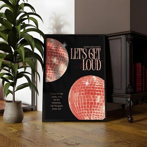 May include: A black poster with two disco balls and the text "LET'S GET LOUD". The disco balls are red and have a reflective surface. The poster also includes the text "Dance until dawn" and "Come for the party, stay for the memories. Let the good times roll!"