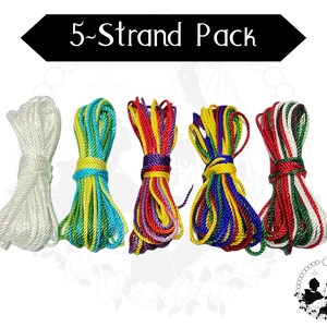 May include: Five spools of 5-strand embroidery floss in different colour combinations: white, green and yellow, red and purple, yellow, green, blue and red, and red, white and green.