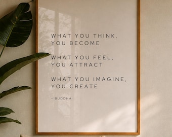 May include: A rectangular wall art print in a thin wooden frame featuring black text on a light beige background. The text reads: WHAT YOU THINK, YOU BECOME. WHAT YOU FEEL, YOU ATTRACT. WHAT YOU IMAGINE, YOU CREATE. - BUDDHA. The print is centered.