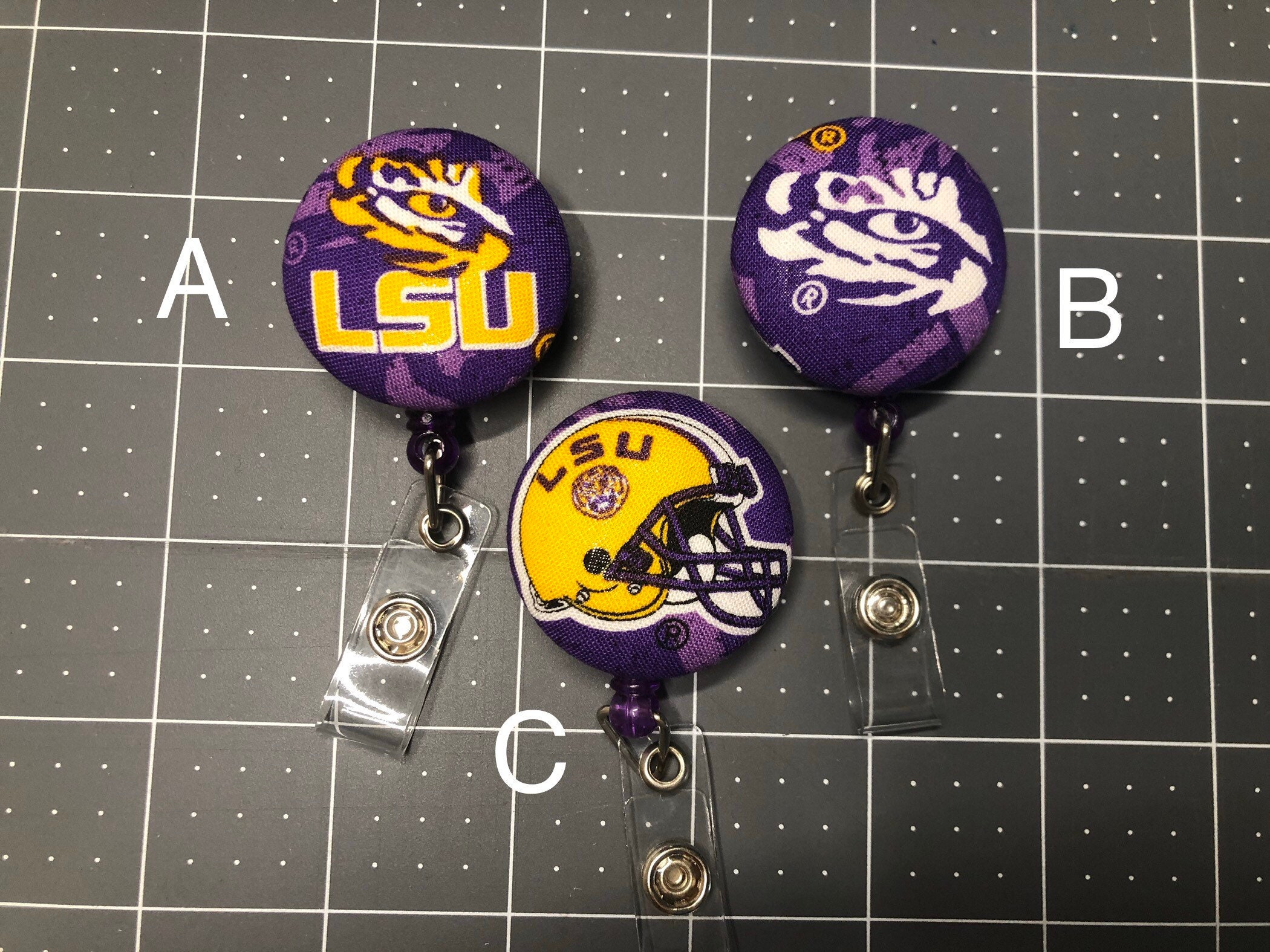 Badge reel, retractable badge reel, ID reel, badge holder. LSU. Louisiana  State university