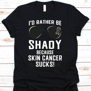 I&#39;d Rather Be Shady Because Skin Cancer Sucks Shirt, Awareness Tee For Skin Cancer Warriors Survivor, Black Ribbon Gift For Melanoma Cancer