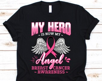 Mi héroe es ahora mi camisa de ángel, conciencia de cáncer para el sobreviviente del guerrero del cáncer de mama, camiseta de cinta rosa para el apoyo del cáncer de mama