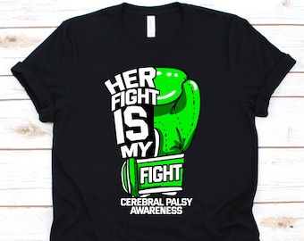 May include: Black t-shirt with a green boxing glove graphic and the text "HER FIGHT IS MY FIGHT" in white. The shirt also includes "CEREBRAL PALSY AWARENESS" in white text. The design is centered on the front of the shirt.